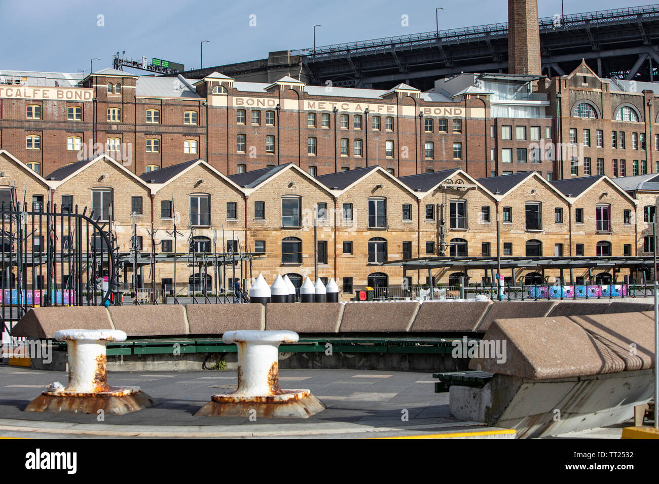 Warehouses beneath the Sydney harbour bridge in Campbells cove,The Rocks,Sydney,Australia Stock Photo