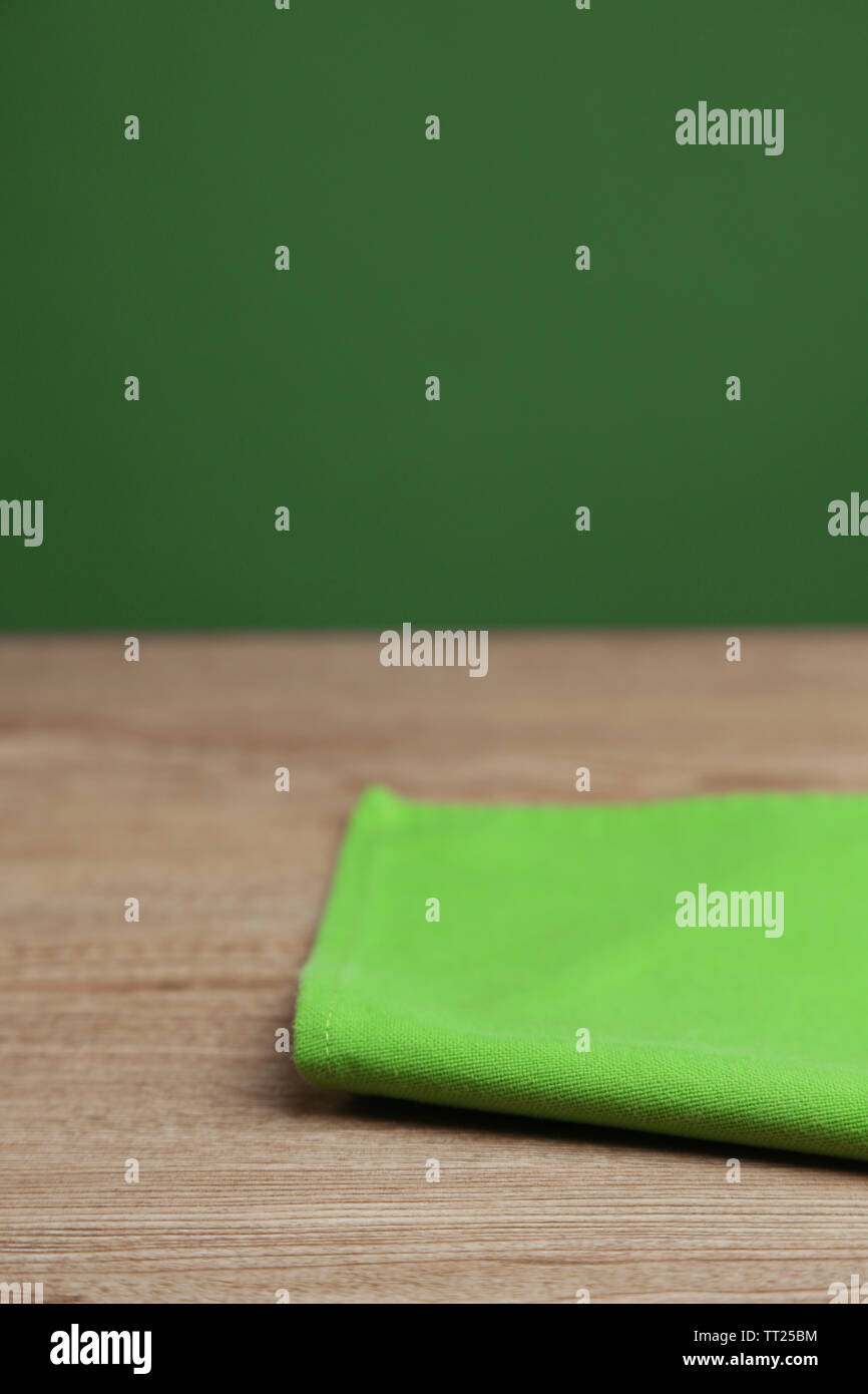 Background with wooden table and tablecloth Stock Photo
