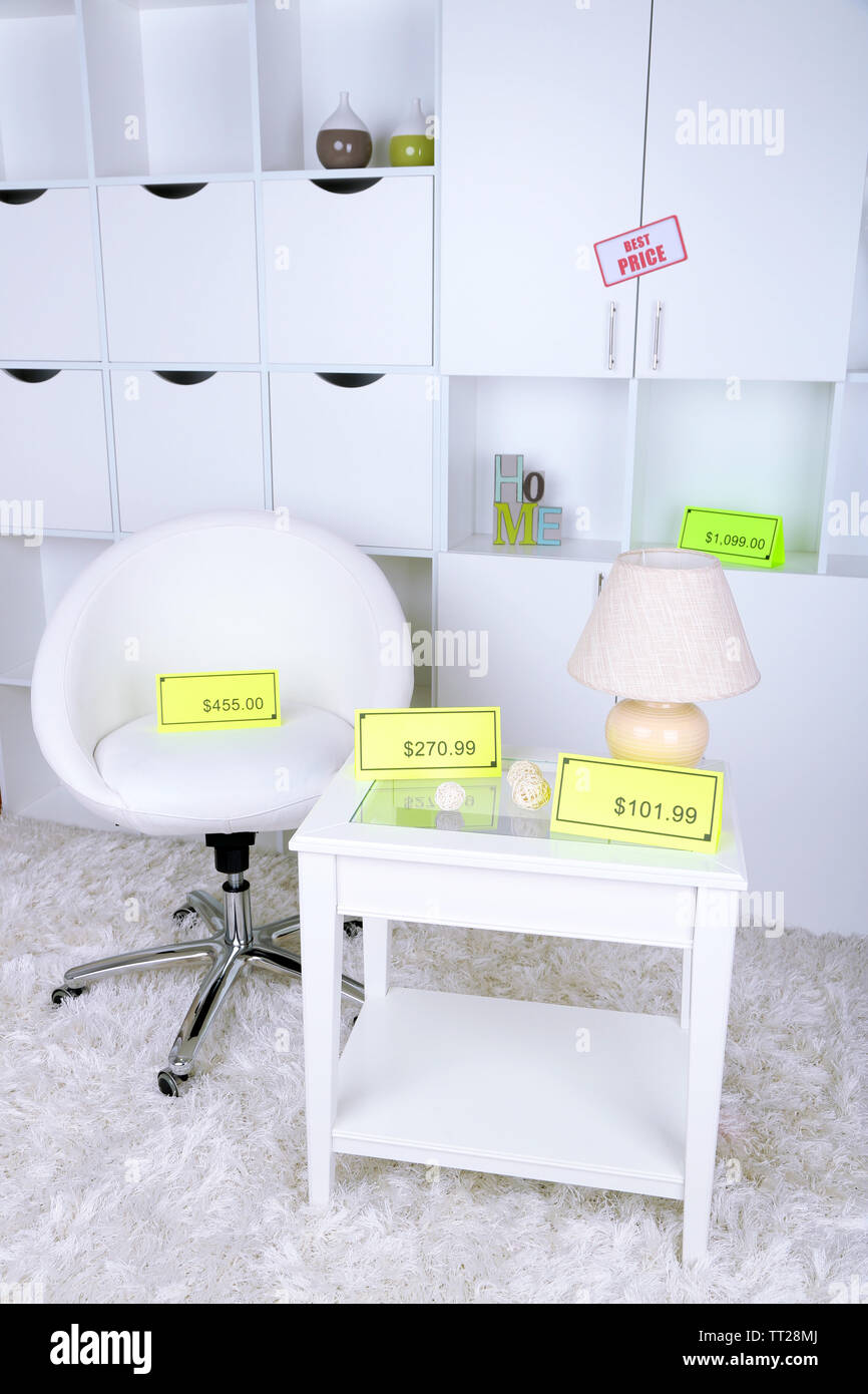 New white furniture with prices Stock Photo Alamy