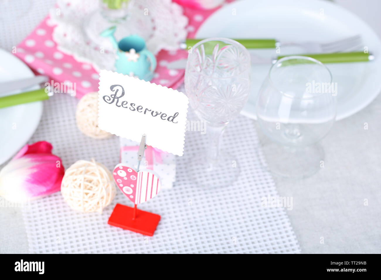 Beautiful spring table setting on light background Stock Photo - Alamy