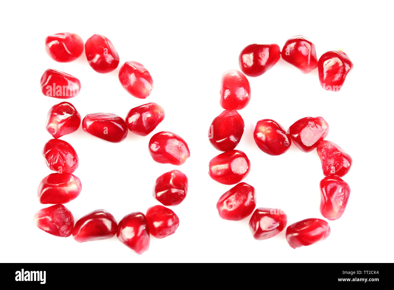 Vitamin B6 sign made of pomegranate seeds, isolated on white Stock ...