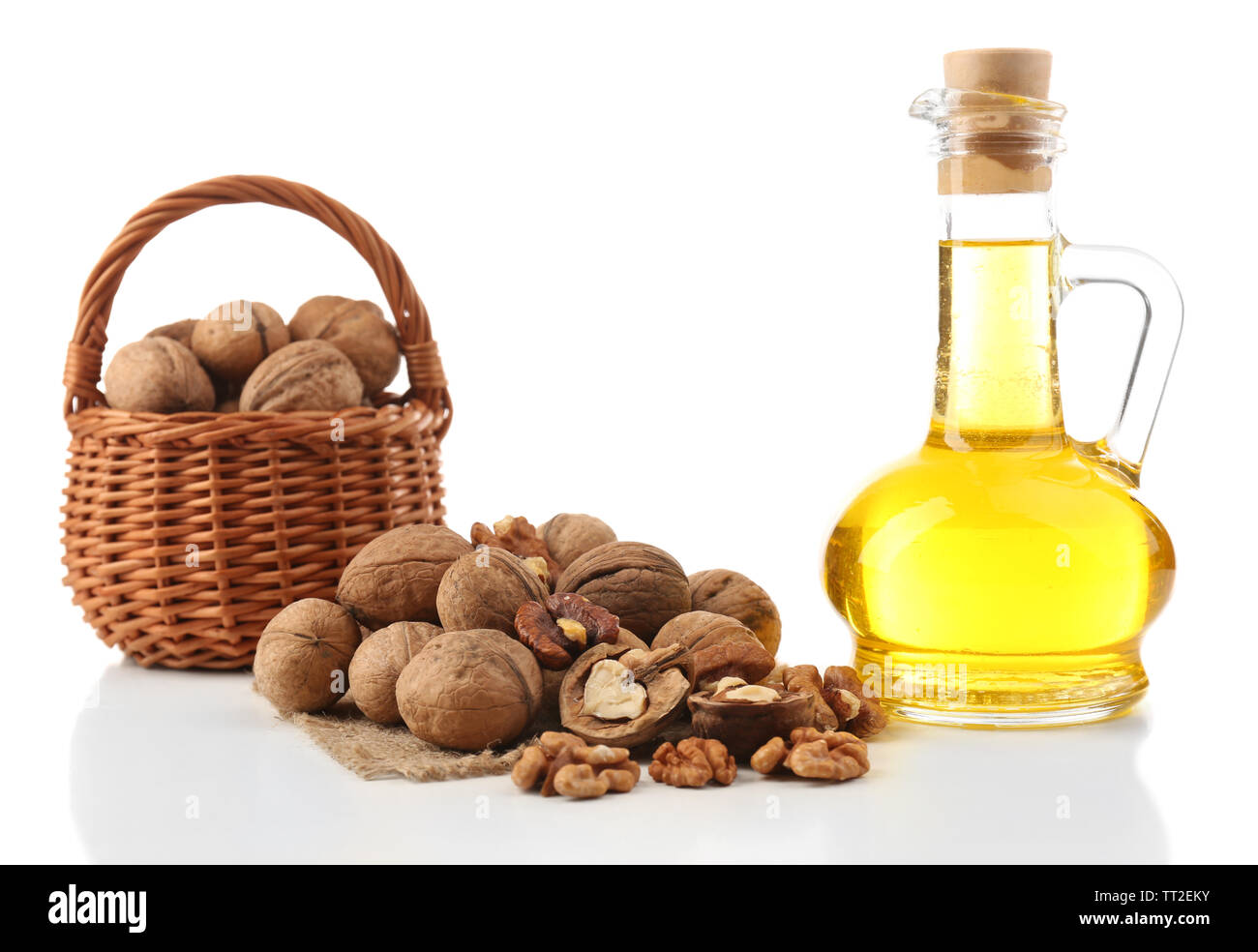 Walnut oil and nuts, isolated on white Stock Photo Alamy