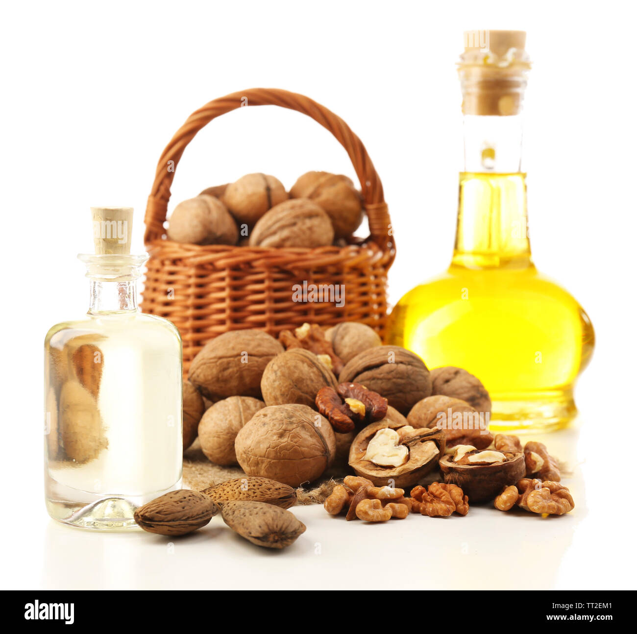 Walnut oil and nuts, isolated on white Stock Photo Alamy