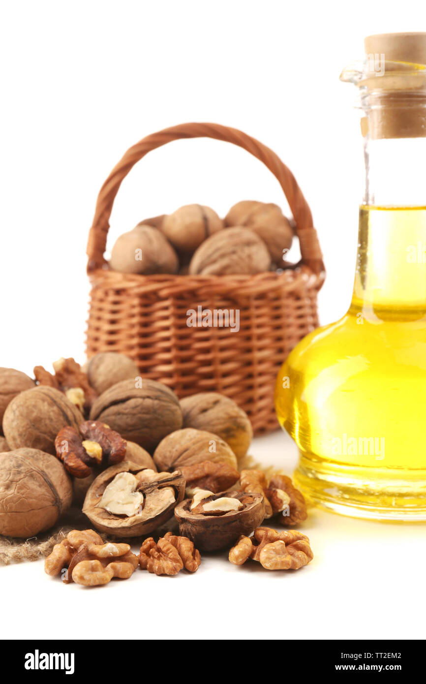 Walnut oil and nuts, isolated on white Stock Photo Alamy
