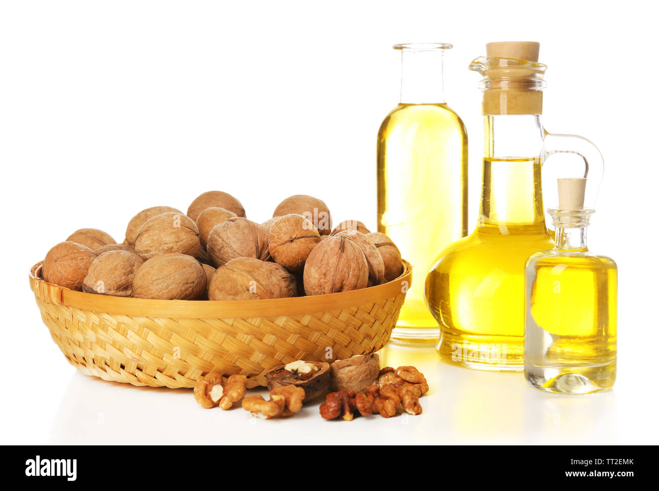 Walnut oil and nuts, isolated on white Stock Photo Alamy