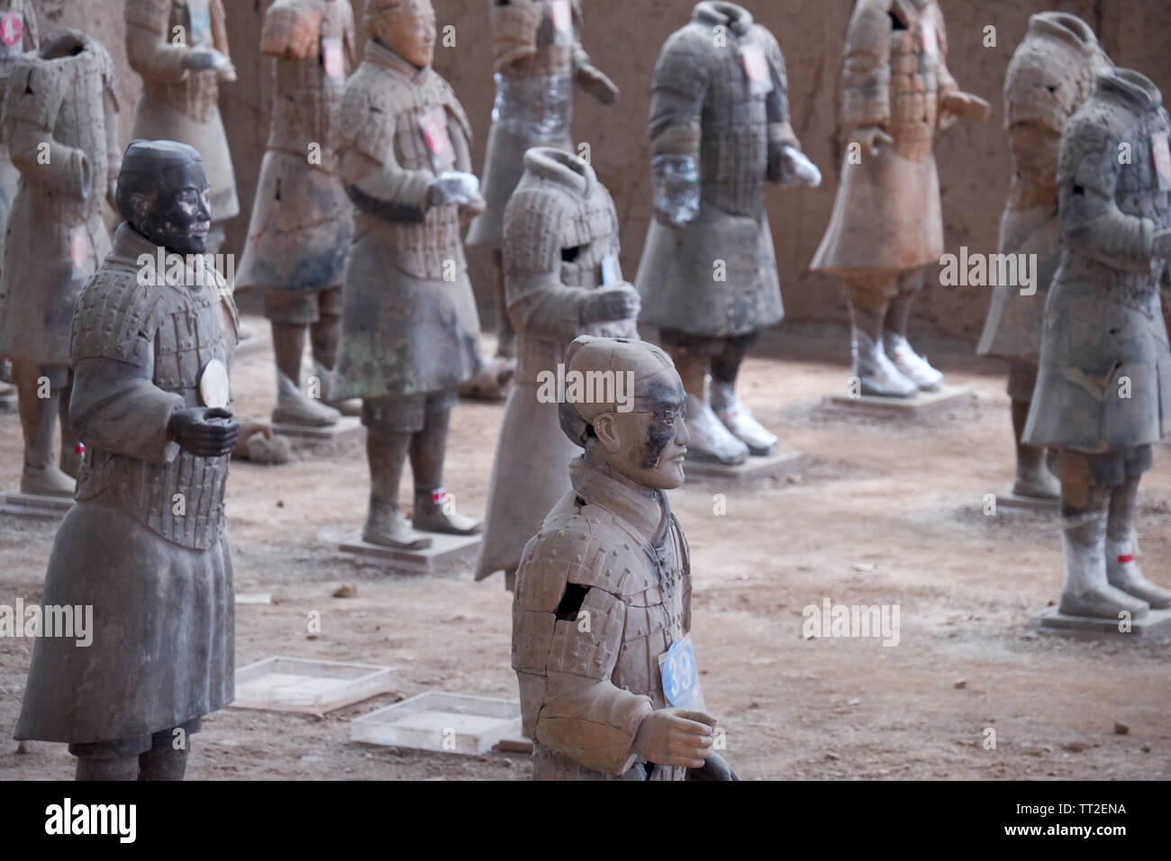 Charred Terra-Cotta Warriors In a recunstruction Pit, Xian, Xaanxi, China Stock Photo