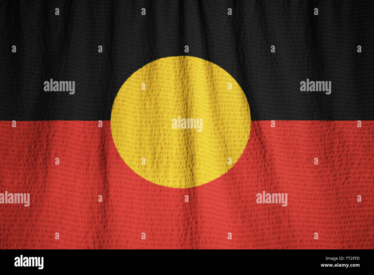 Ruffled Flag of Australian Aboriginal Blowing in Wind Stock Photo