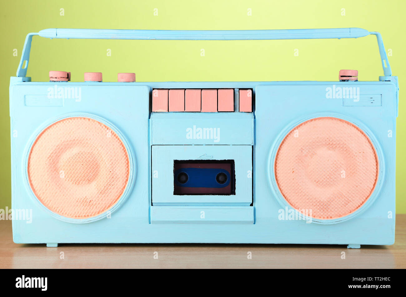 Colorful retro radio, on green background Stock Photo