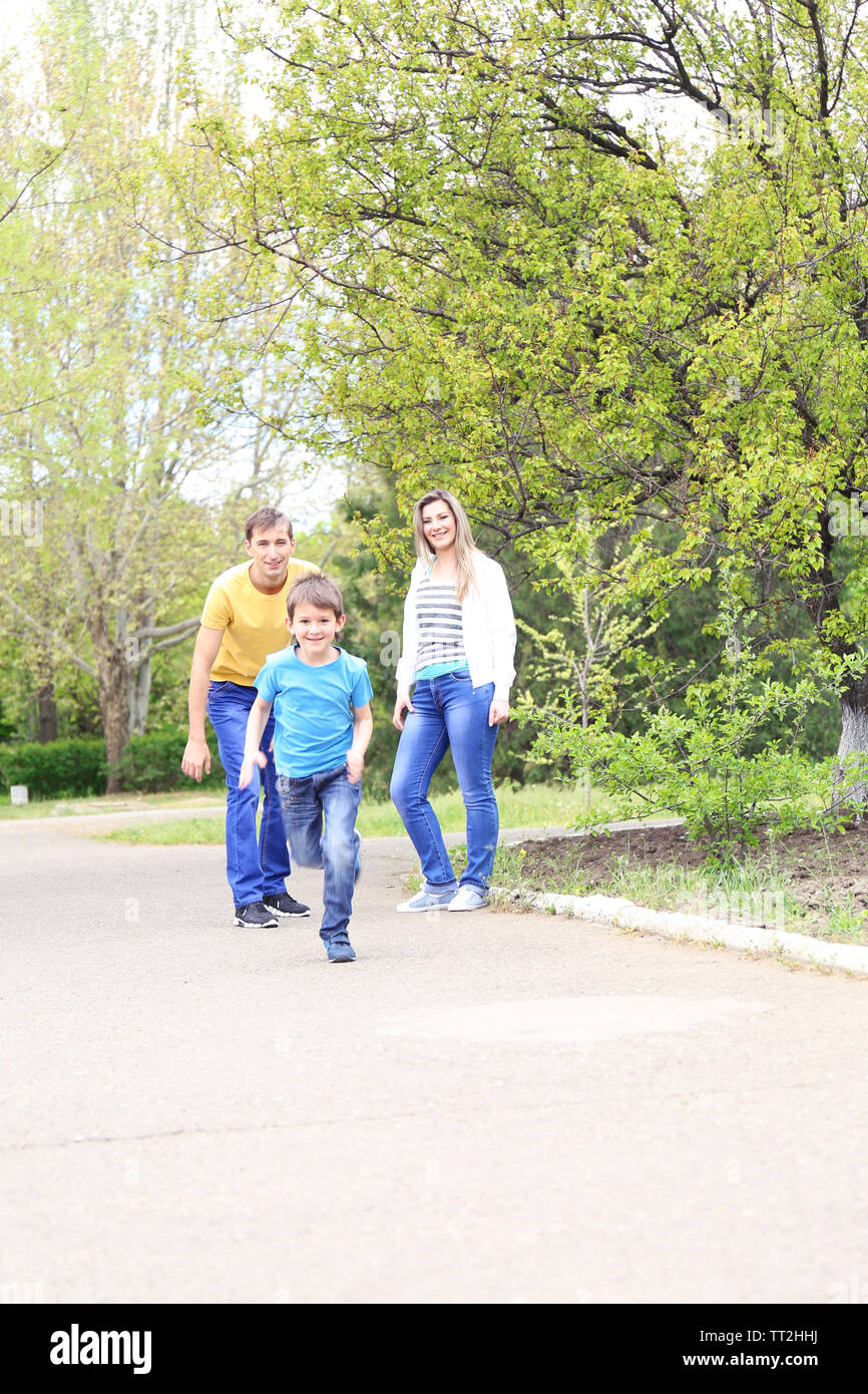 Happy family, walk in the park Stock Photo - Alamy