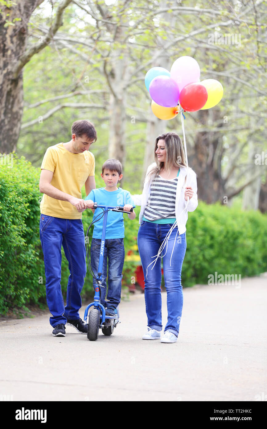 Happy family, walk in the park Stock Photo - Alamy