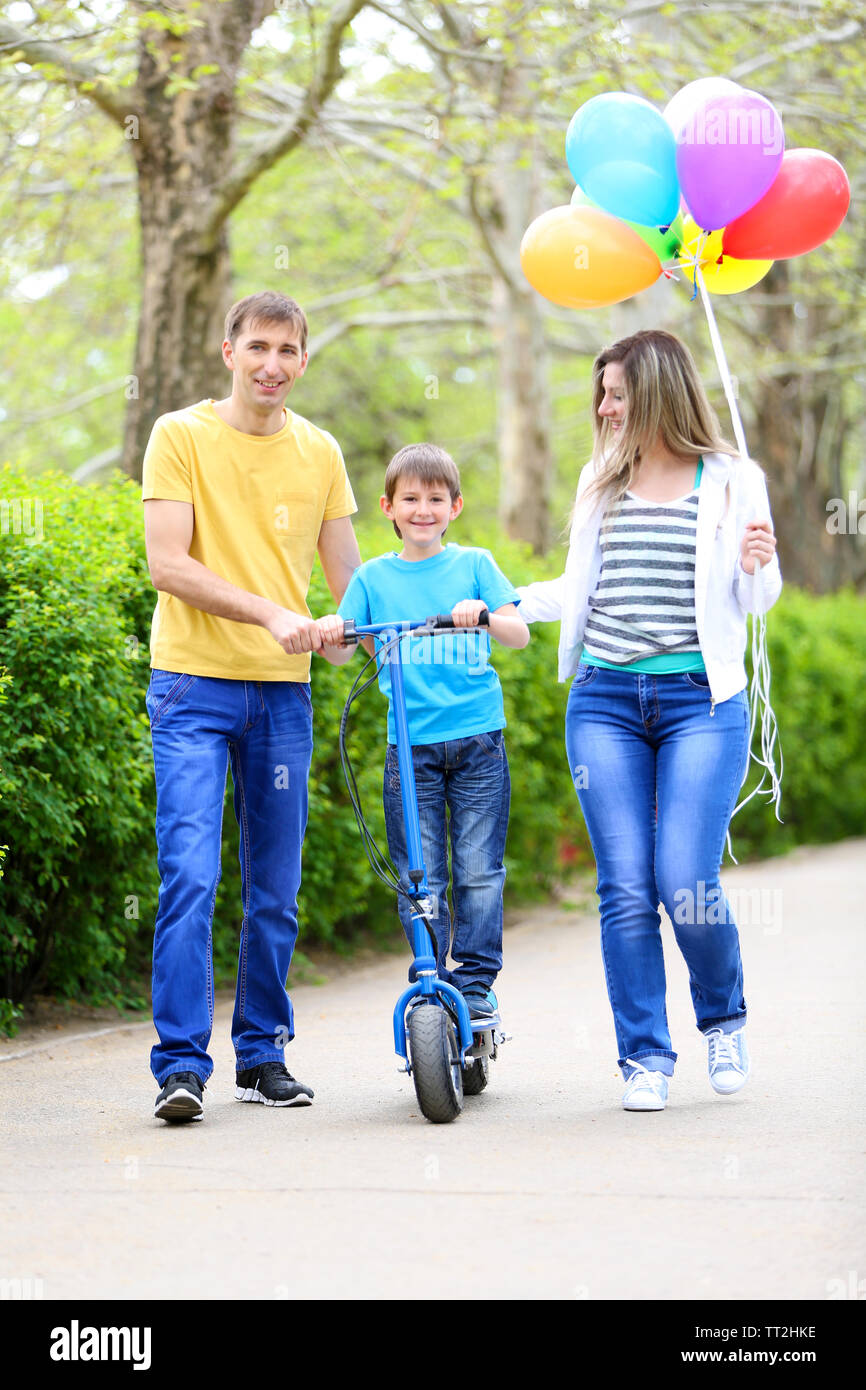 Happy family, walk in the park Stock Photo - Alamy