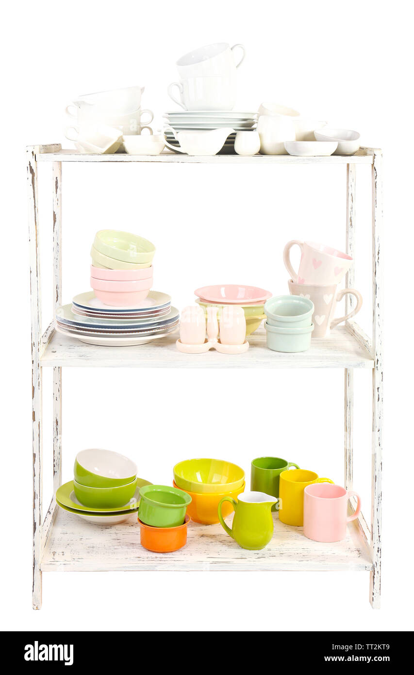 Different tableware on shelf, isolated on white Stock Photo - Alamy