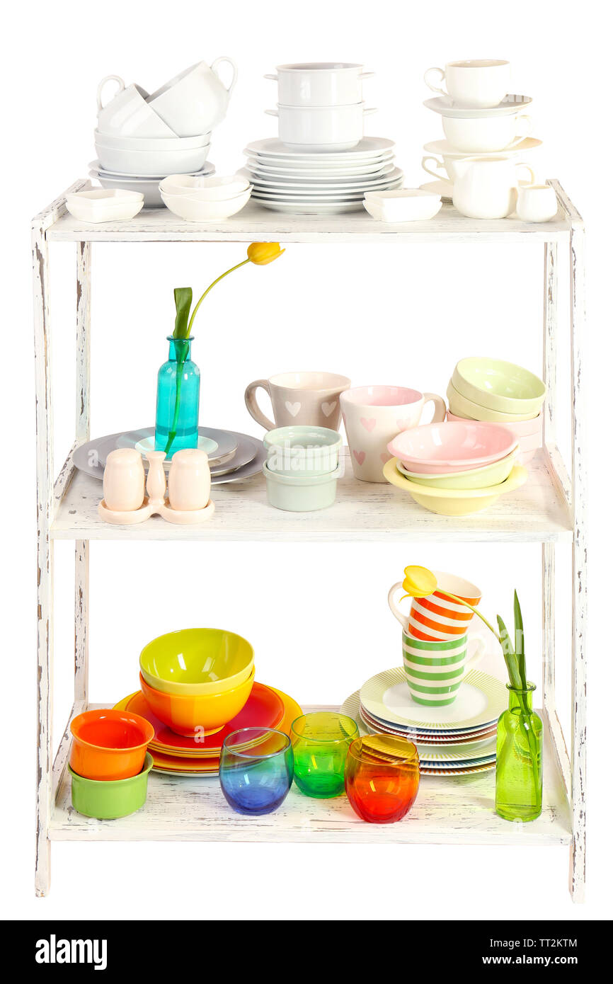 Different tableware on shelf, isolated on white Stock Photo - Alamy