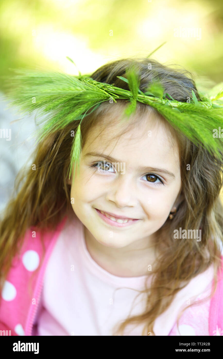 Happy little girl in the green park Stock Photo Alamy