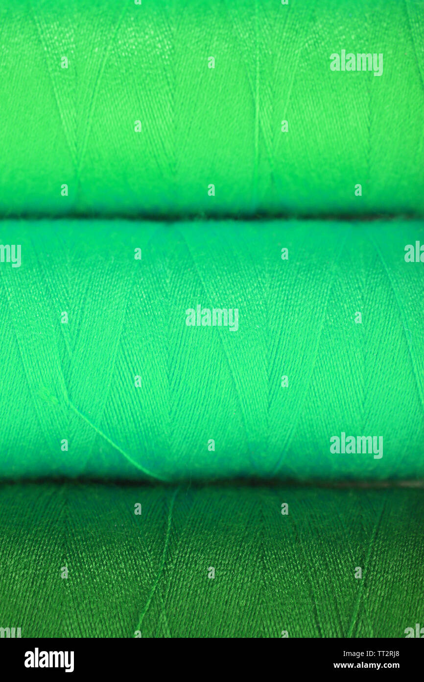 Color sewing threads background Stock Photo - Alamy