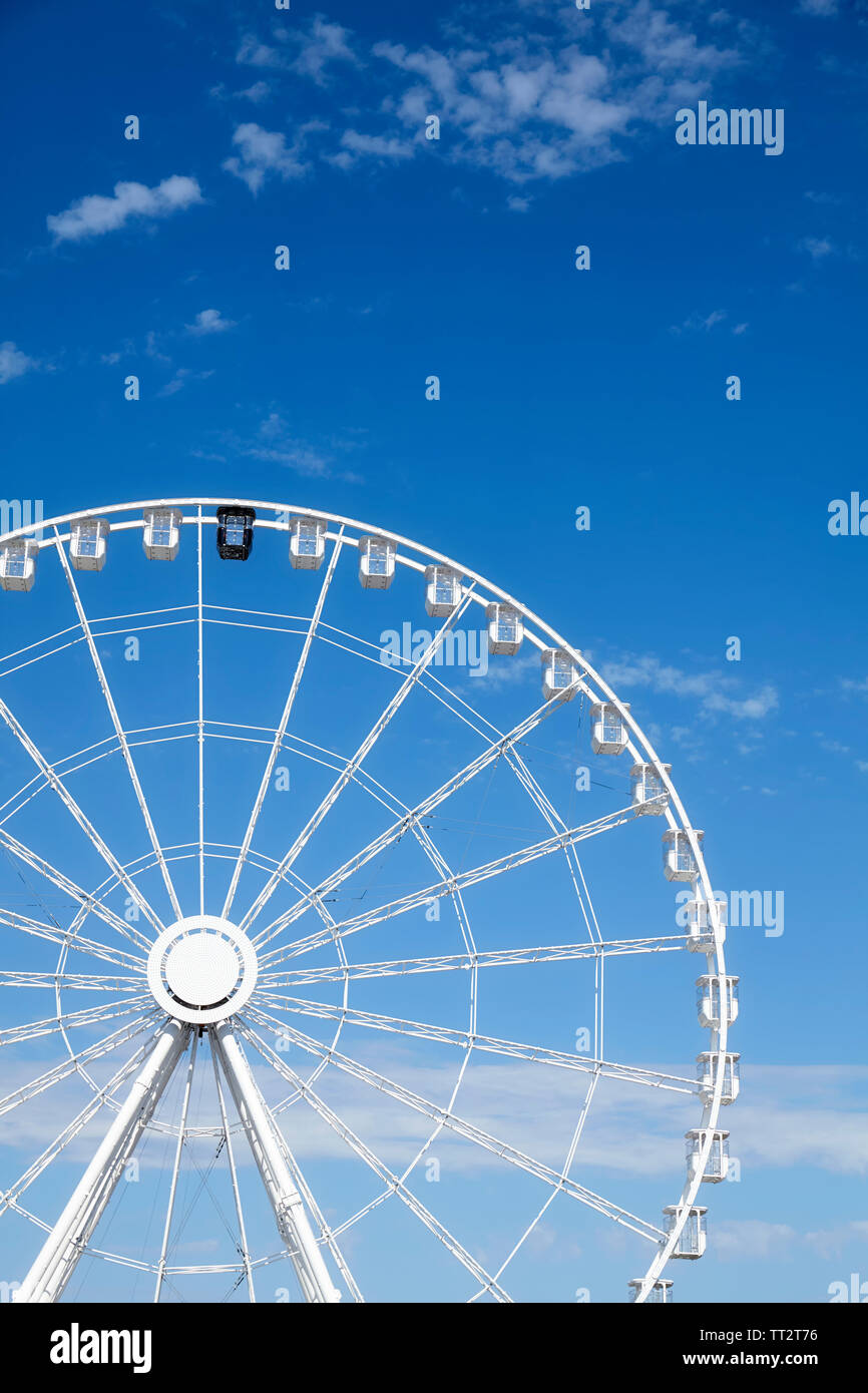 Picture of a Ferris wheel against the blue sky. Stock Photo