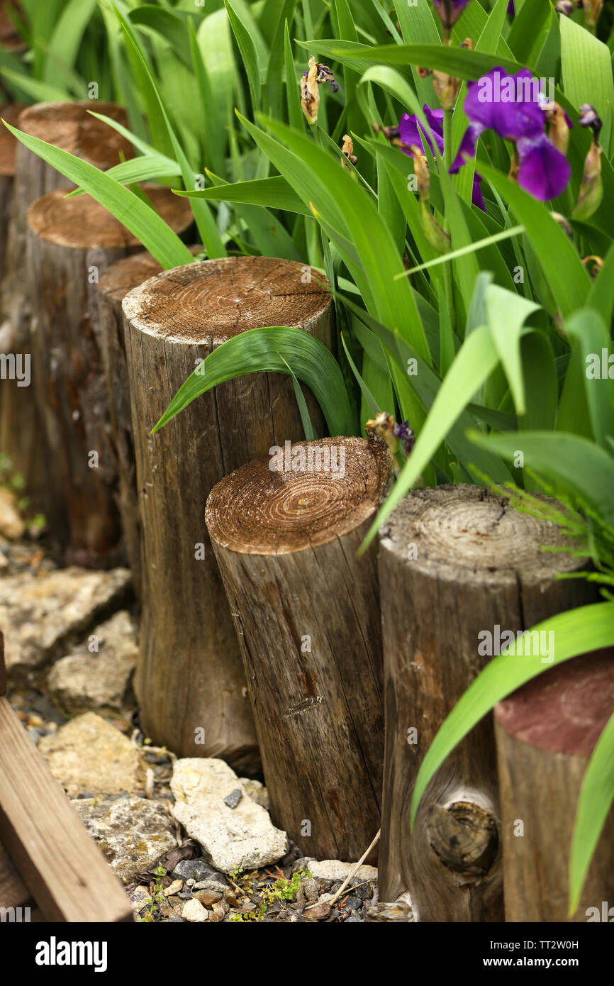 Old wooden fence in the garden Stock Photo - Alamy