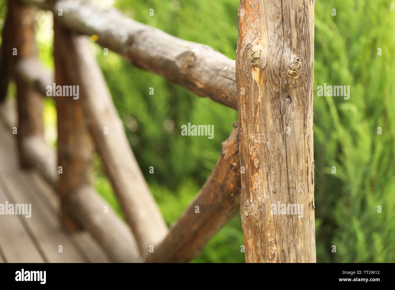 Old wooden fence in the garden Stock Photo - Alamy