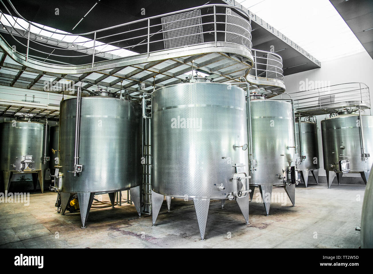Some wine metallic fermentation tanks. Wine industry in winery Vina Undurraga in Talagante Chile. The foundation was established in 1885 by Don Franci Stock Photo