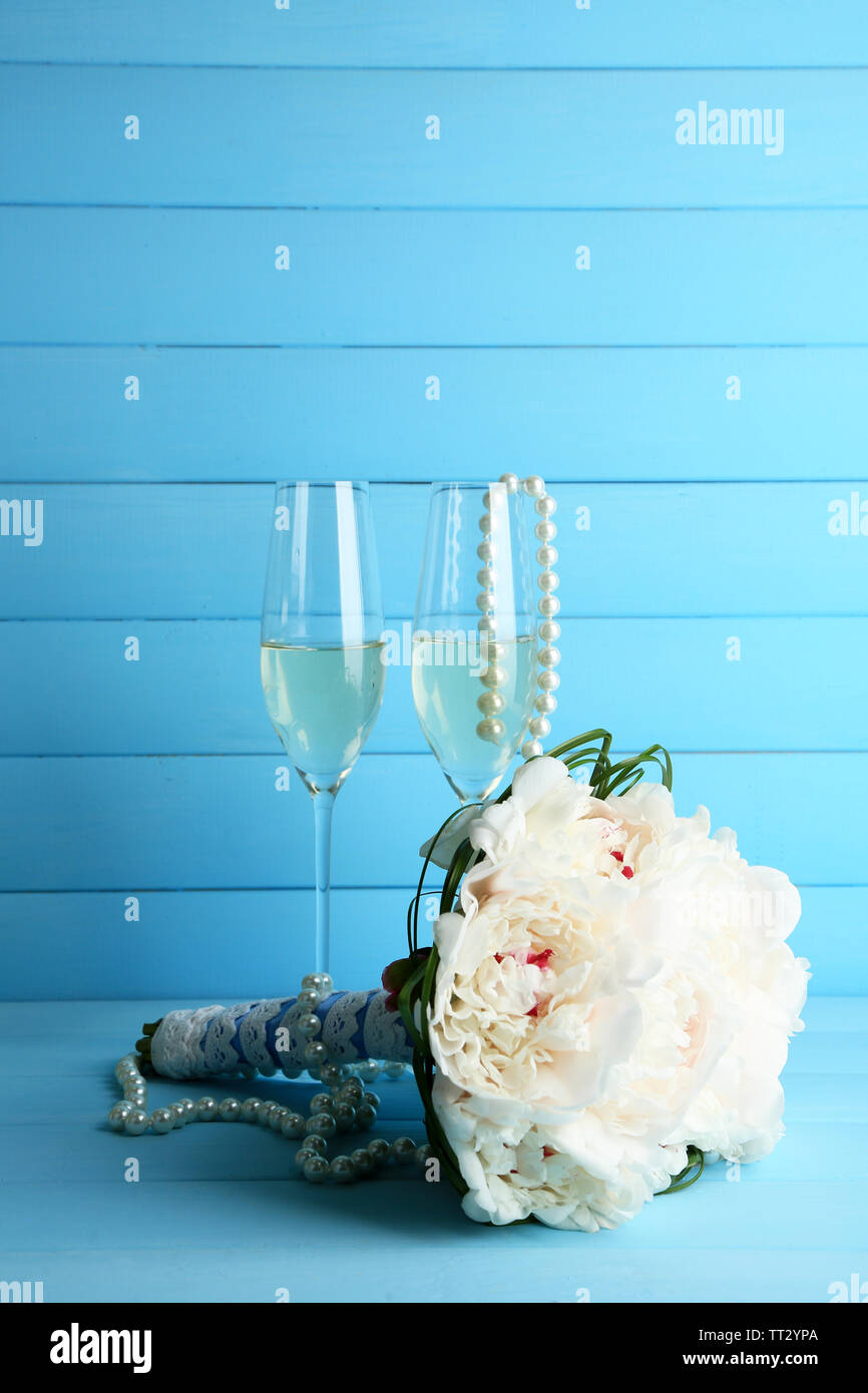 Beautiful Wedding Bouquet And Wine Glasses On Color Background Stock Photo Alamy