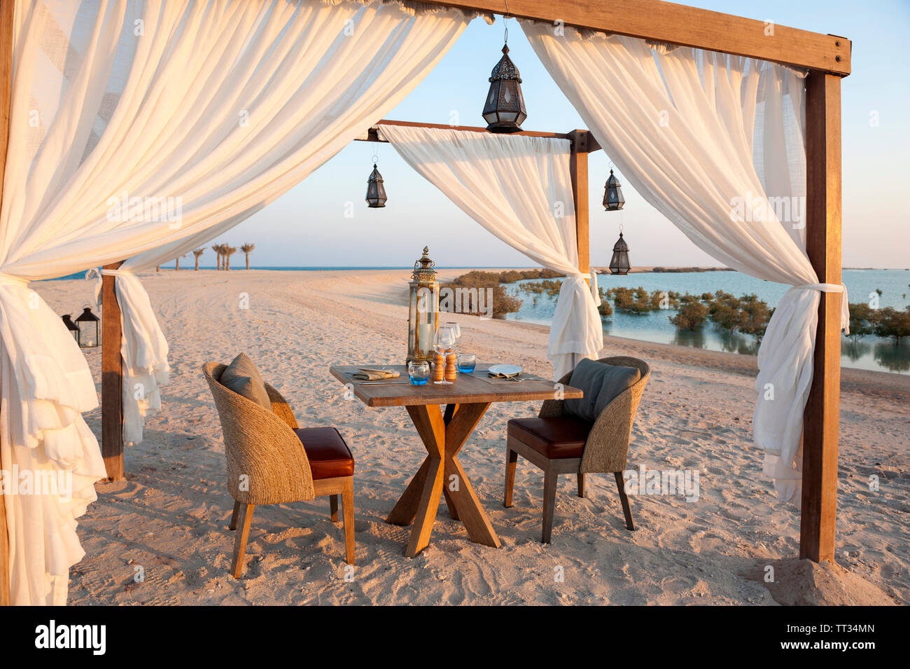 Dining by Design, private dining, at the Anantara Al Yamm Villa Resort on Sir Bani Yas, United Arab Emirates. Stock Photo