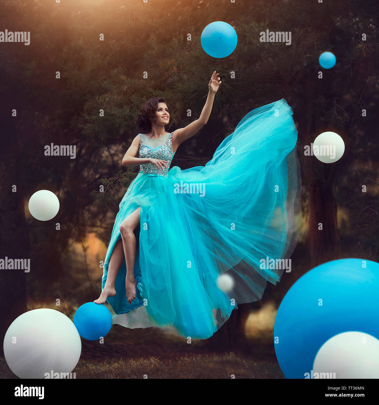 Young girl in a ball gown hi-res stock 