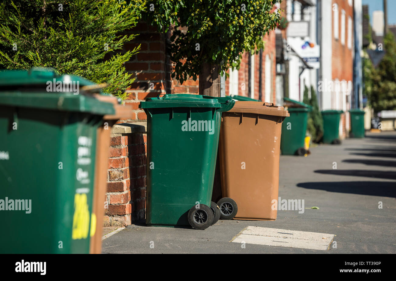 Wheelie bins awaiting collection on a street in the United Kingdom