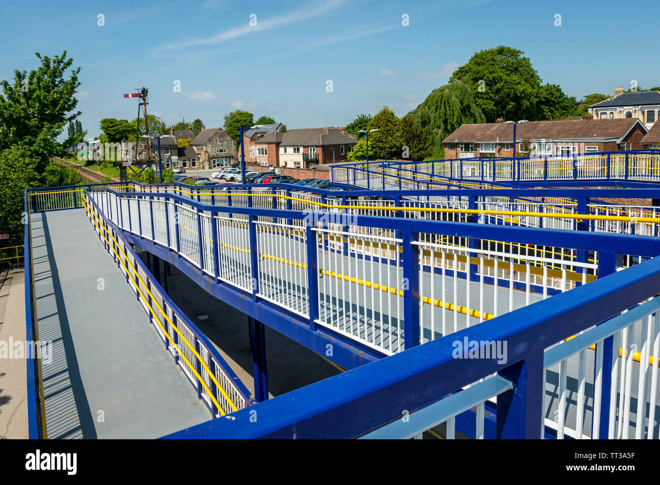 Ramps leading to a bridge crossing the track at Brough railway station, Yorkshire, England. Stock Photo