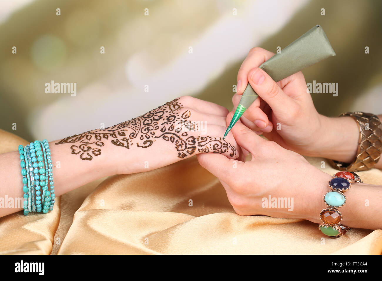Process of applying Mehndi on female hand, close up Stock Photo Alamy