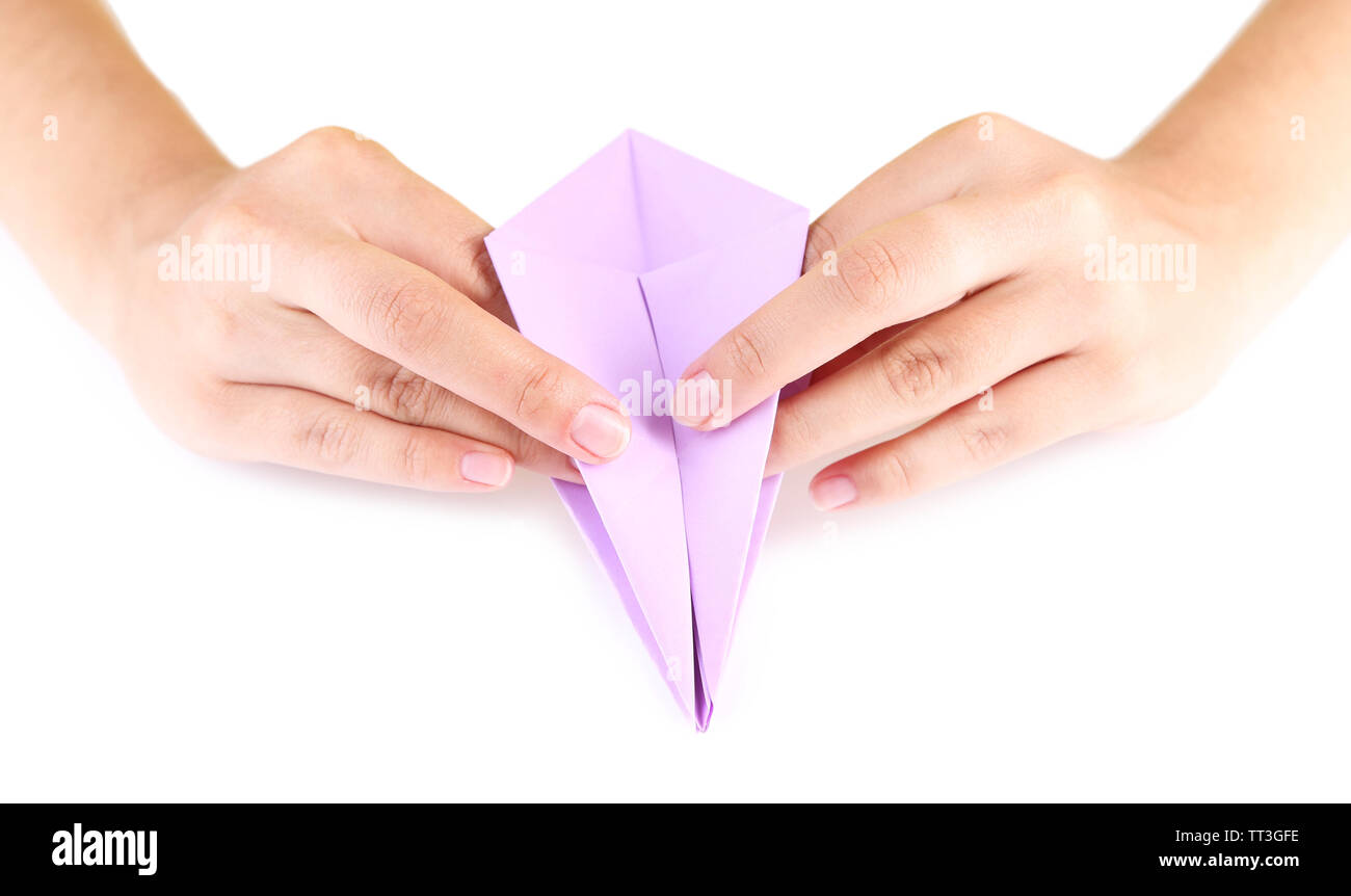 Hands making origami toy, close up, isolated on white Stock Photo - Alamy