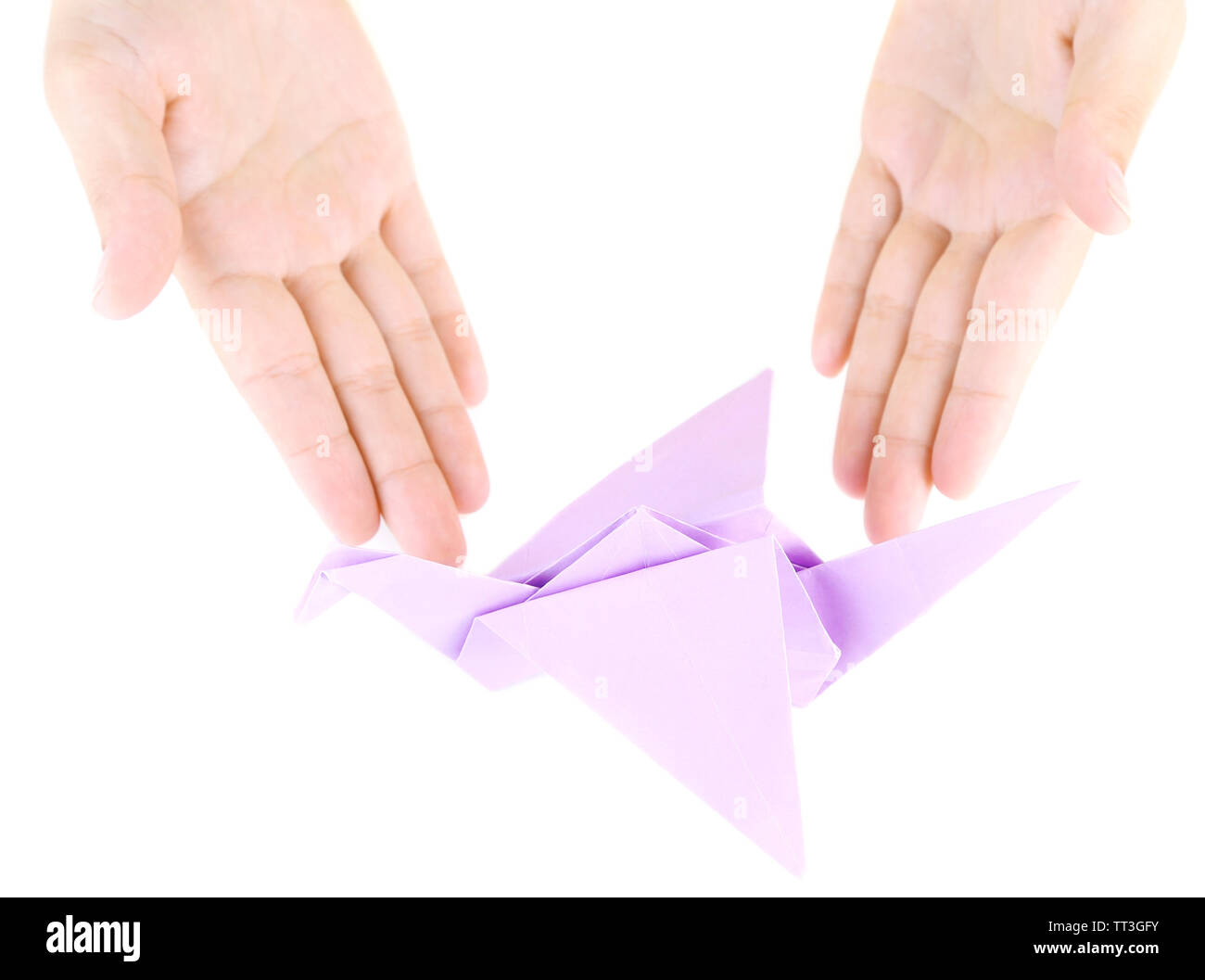 Hands Making Origami Toy Close Up Isolated On White Stock