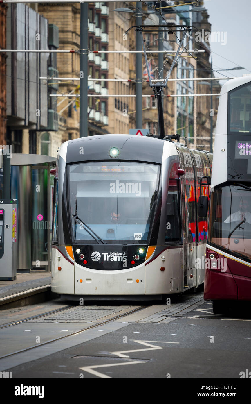 Tram waiting at a stop in the centre of the City of Edinburgh, Scotland. Stock Photo