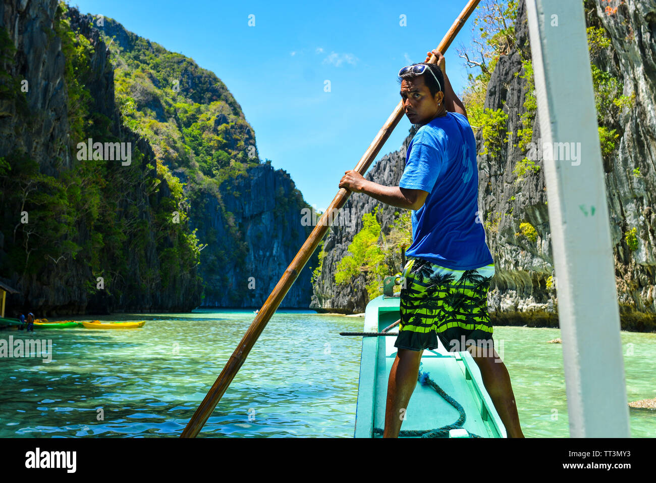 El Nido, Philippines, 25th, February, 2016. The captain was rowing on the boat. El Nido is a 1st class municipality in the province of Palawan. Stock Photo