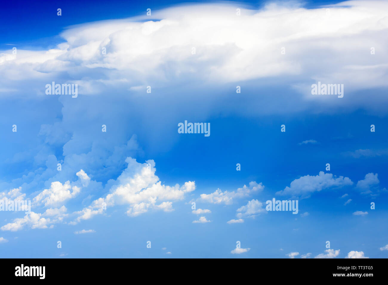 View of the wing of airplane with blue sky and white cloud on high ...