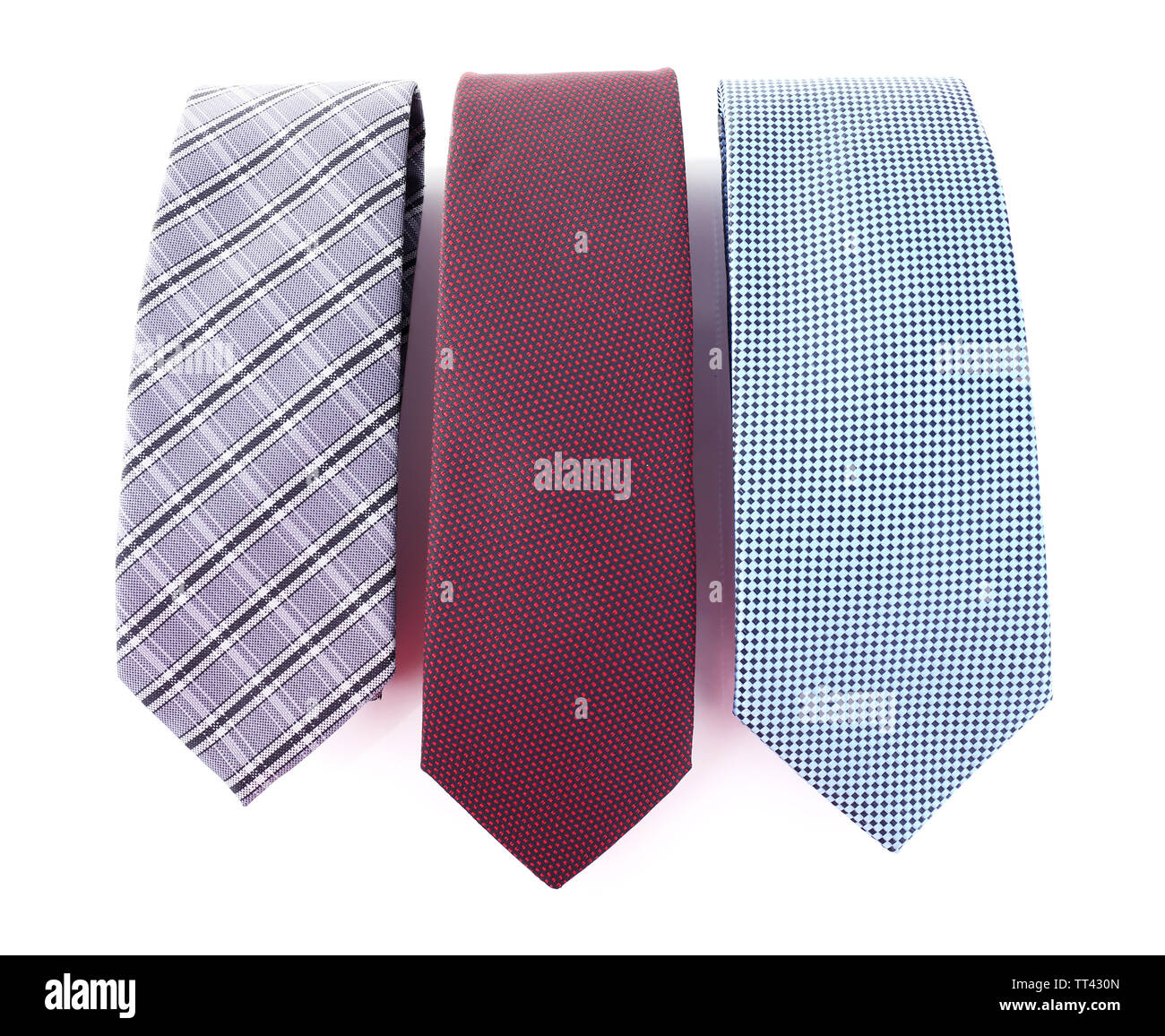 Brown, blue and grey ties on white background isolated Stock Photo Alamy