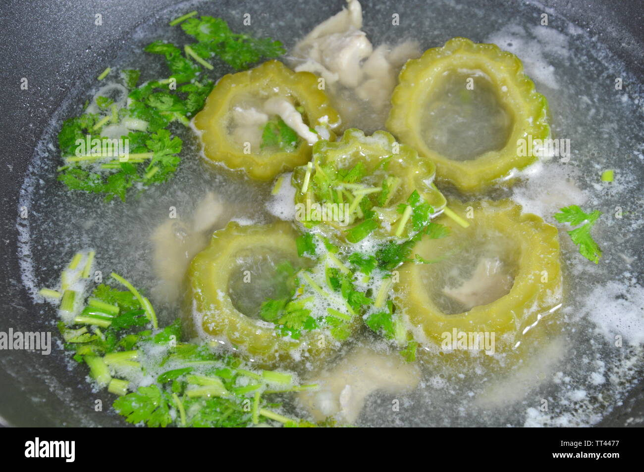 boiled bitter cucumber in hot pot Stock Photo Alamy