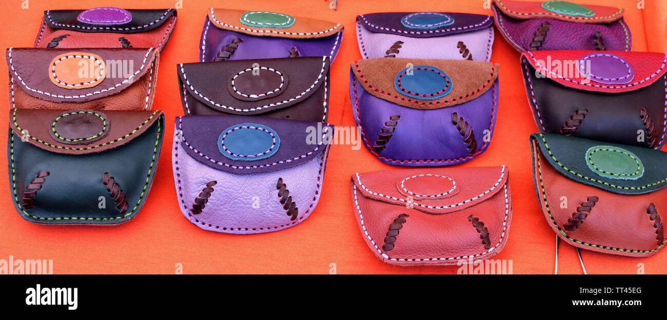 Hand made leather purses in different colors and designs Stock Photo