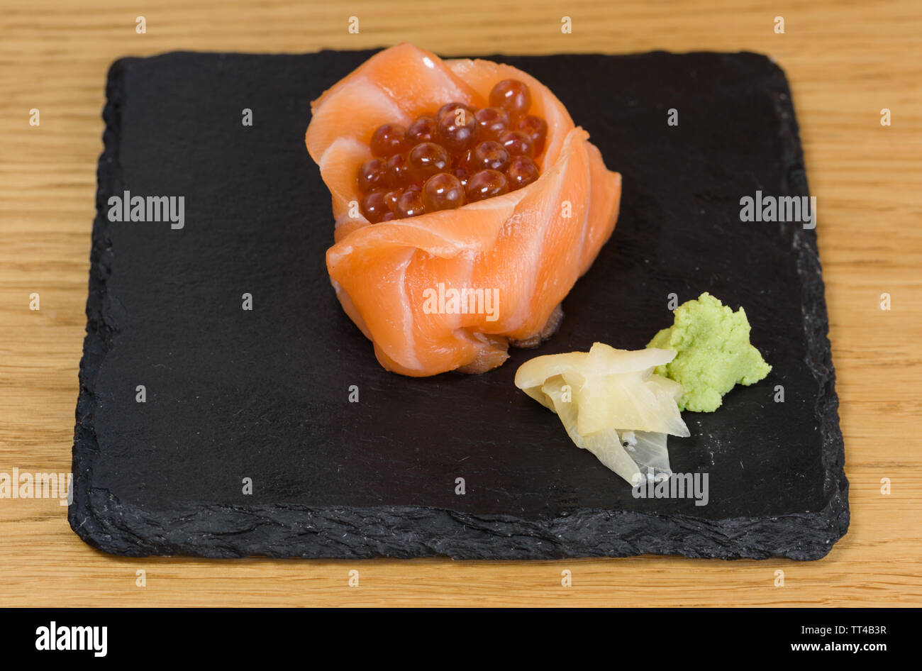 composition of fish food, salmon fillets mounted in the shape of a cup