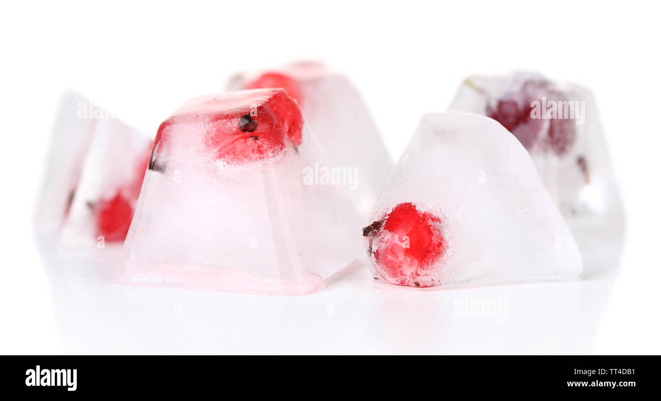 Ice cubes with cranberry, isolated on white Stock Photo - Alamy