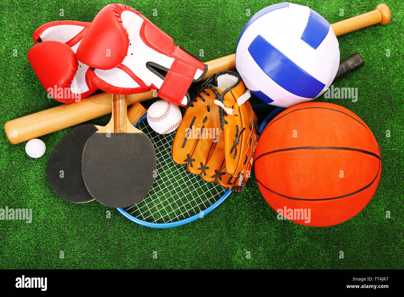 Sports equipment on grass background Stock Photo Alamy