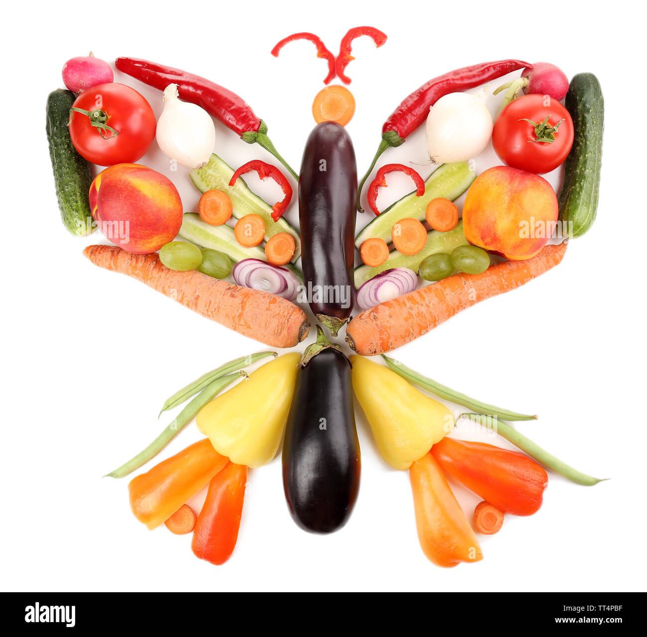Fresh organic vegetables and fruits in shape of butterfly, isolated on