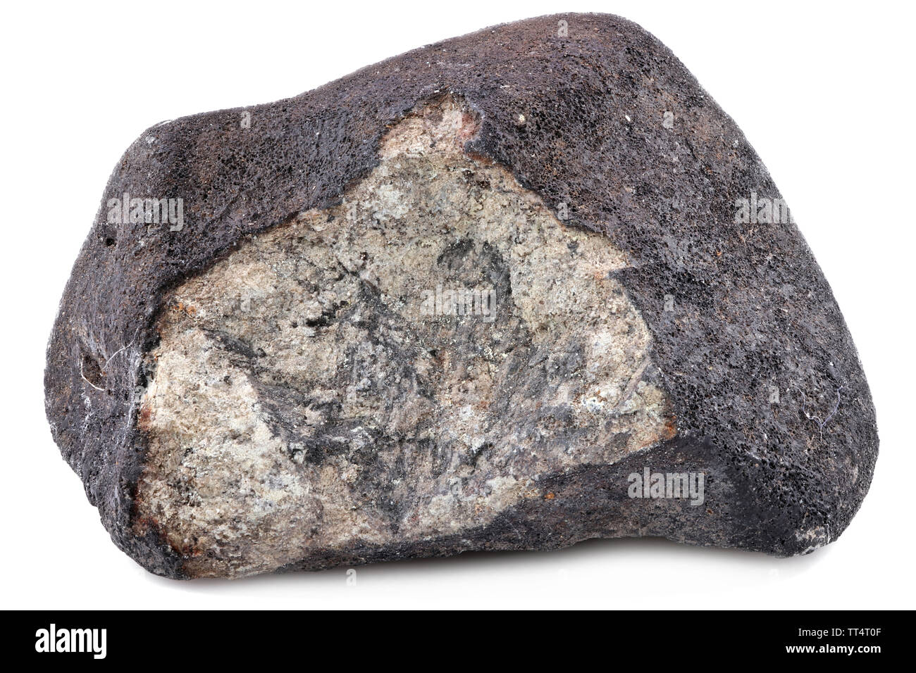 fragment of the Chelyabinsk meteorite (fallen 15 February 2013) isolated on white background Stock Photo