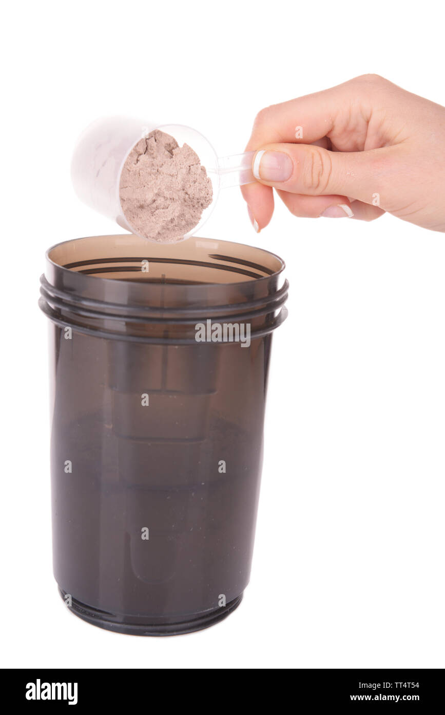 Female Hand Holding Scoop With Whey Protein Powder And Plastic