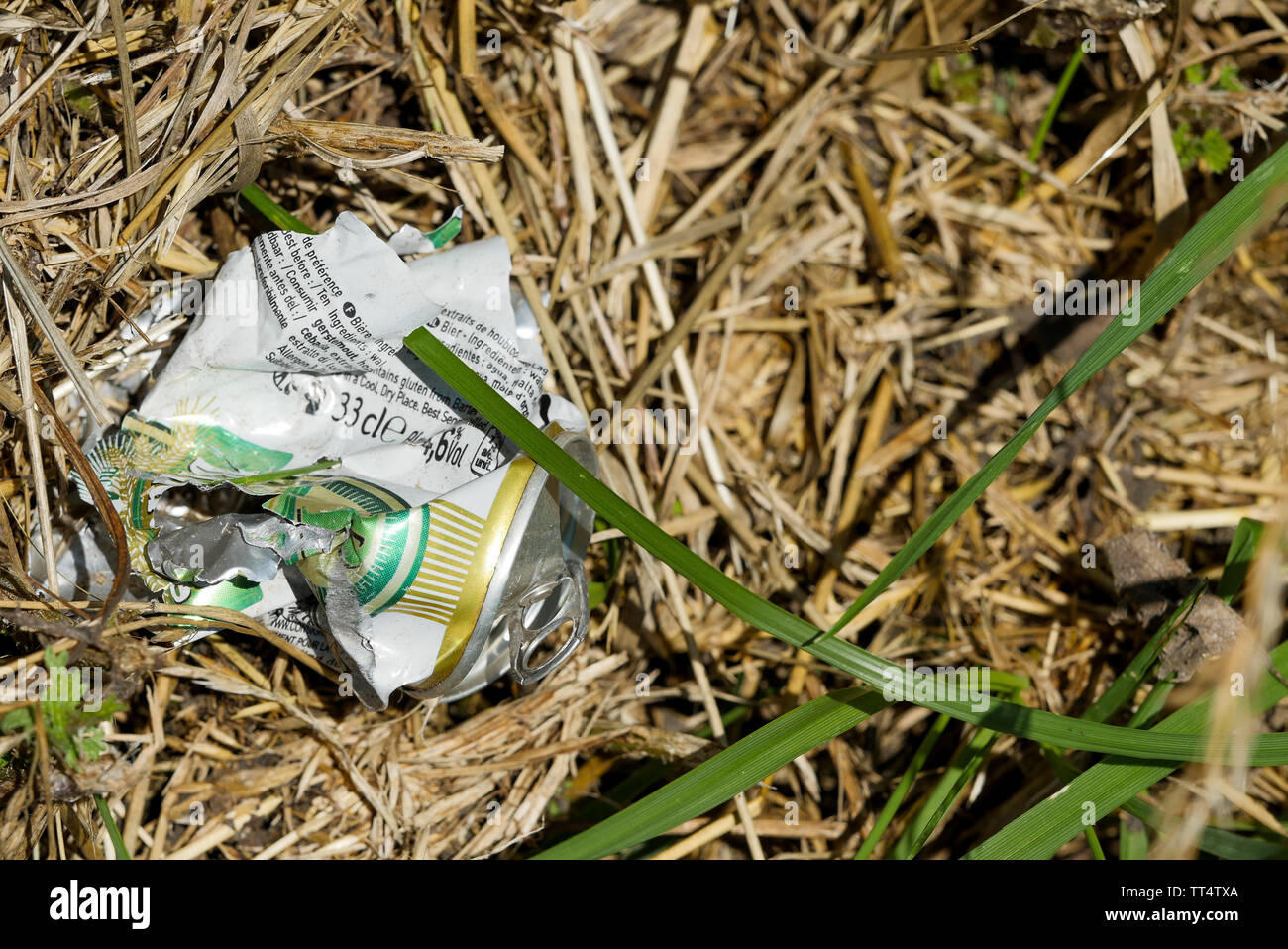 Beer Rings Polution Pollution, shredded beerr can abandoned on a roadside verge, France ...