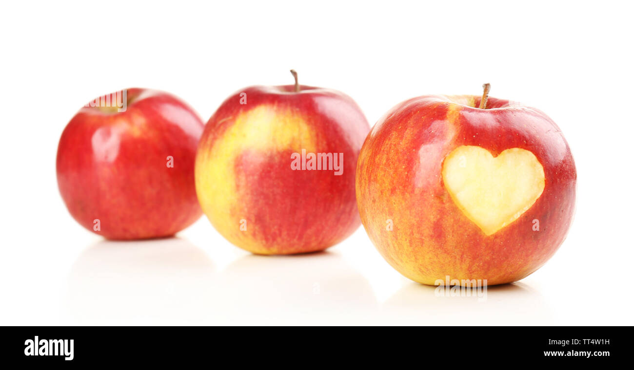 Red apple with heart isolated on white Stock Photo