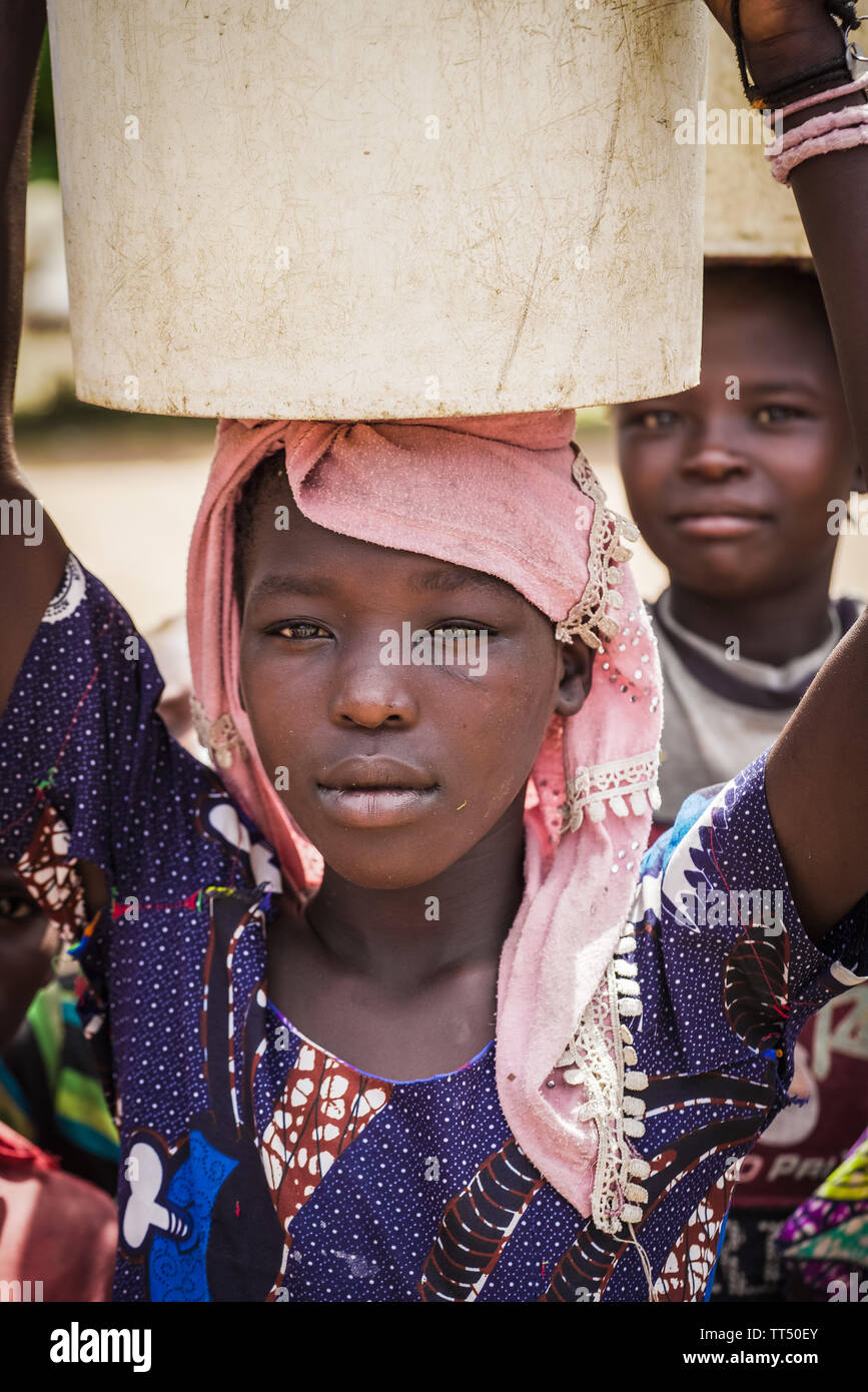 African kid bucket on head hires stock photography and images Alamy