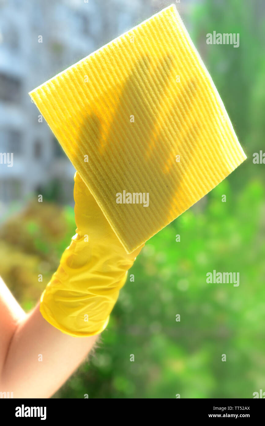 Cleaning windows with special rag Stock Photo Alamy
