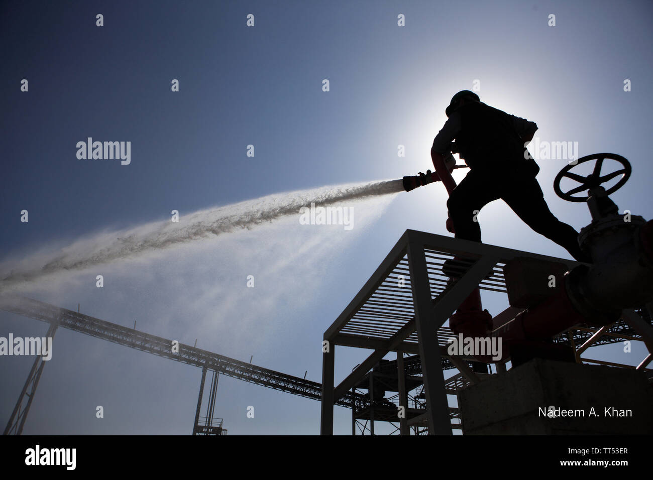 Fire fighter action hi-res stock photography and images - Alamy