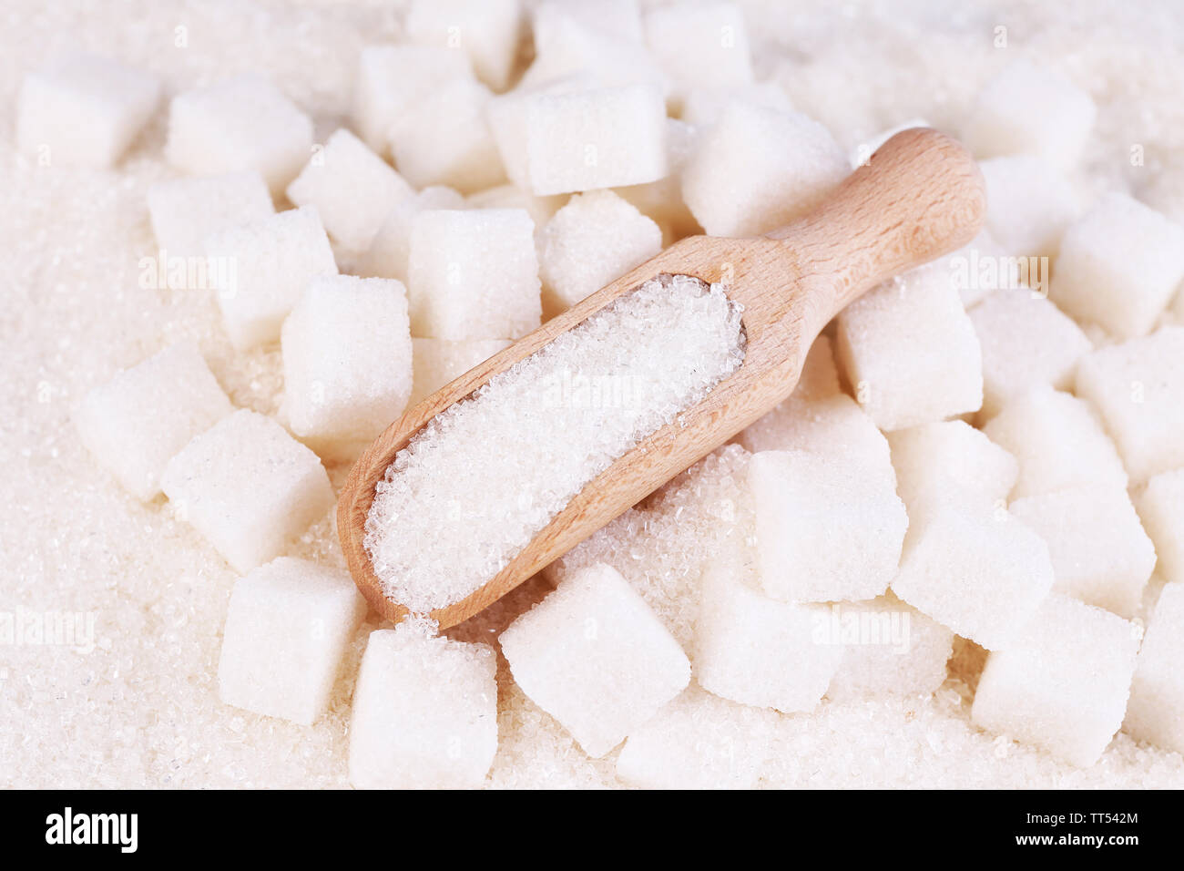 White sugar in light background background Stock Photo Alamy