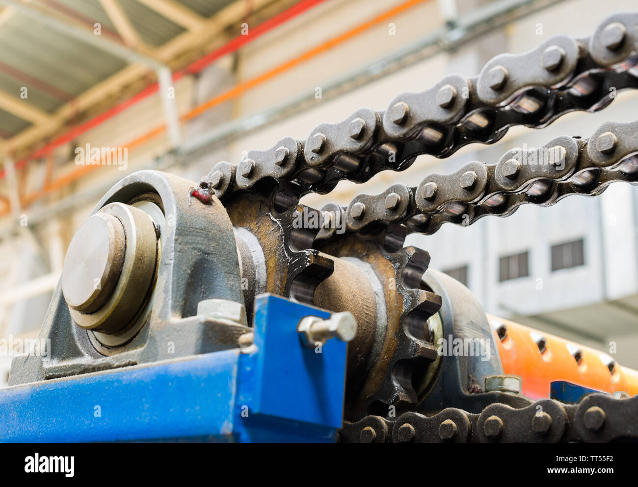 The mechanism of the chain transmission. Bearing, drive shaft, gear and